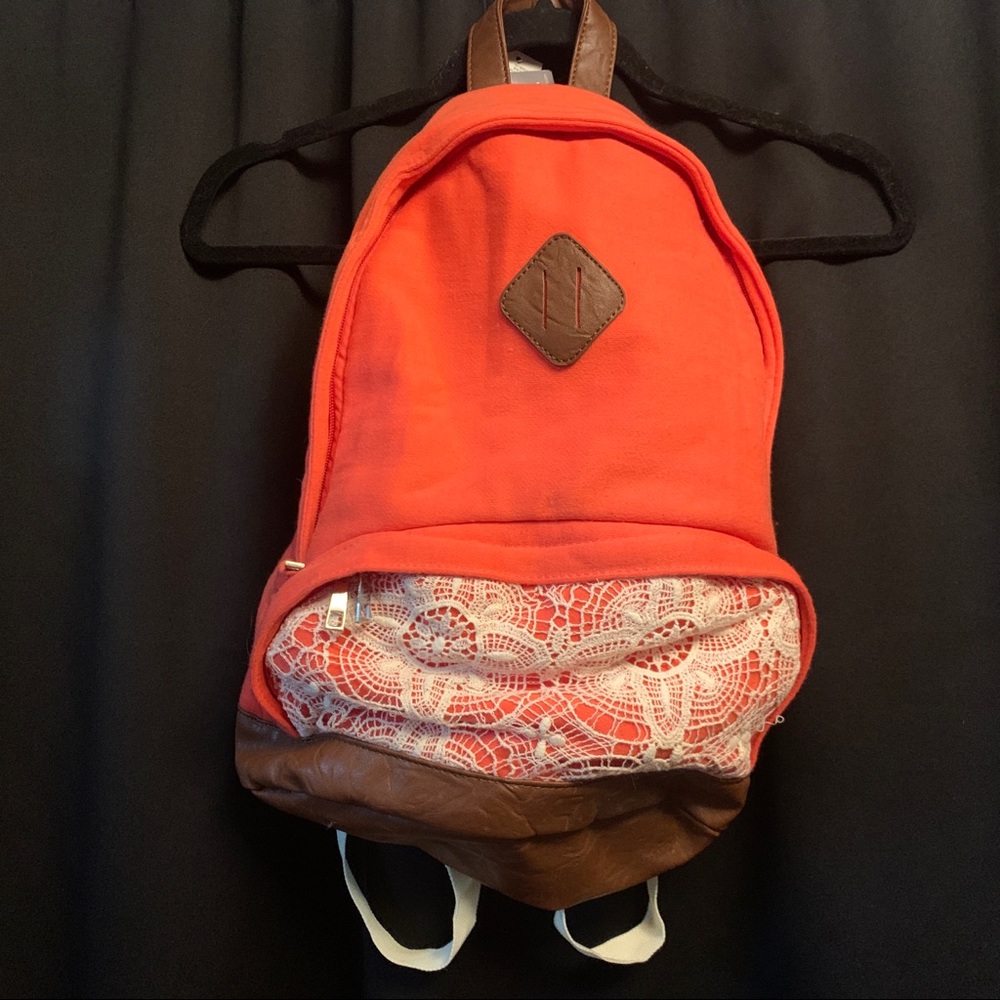 Coral small backpack with lace detail